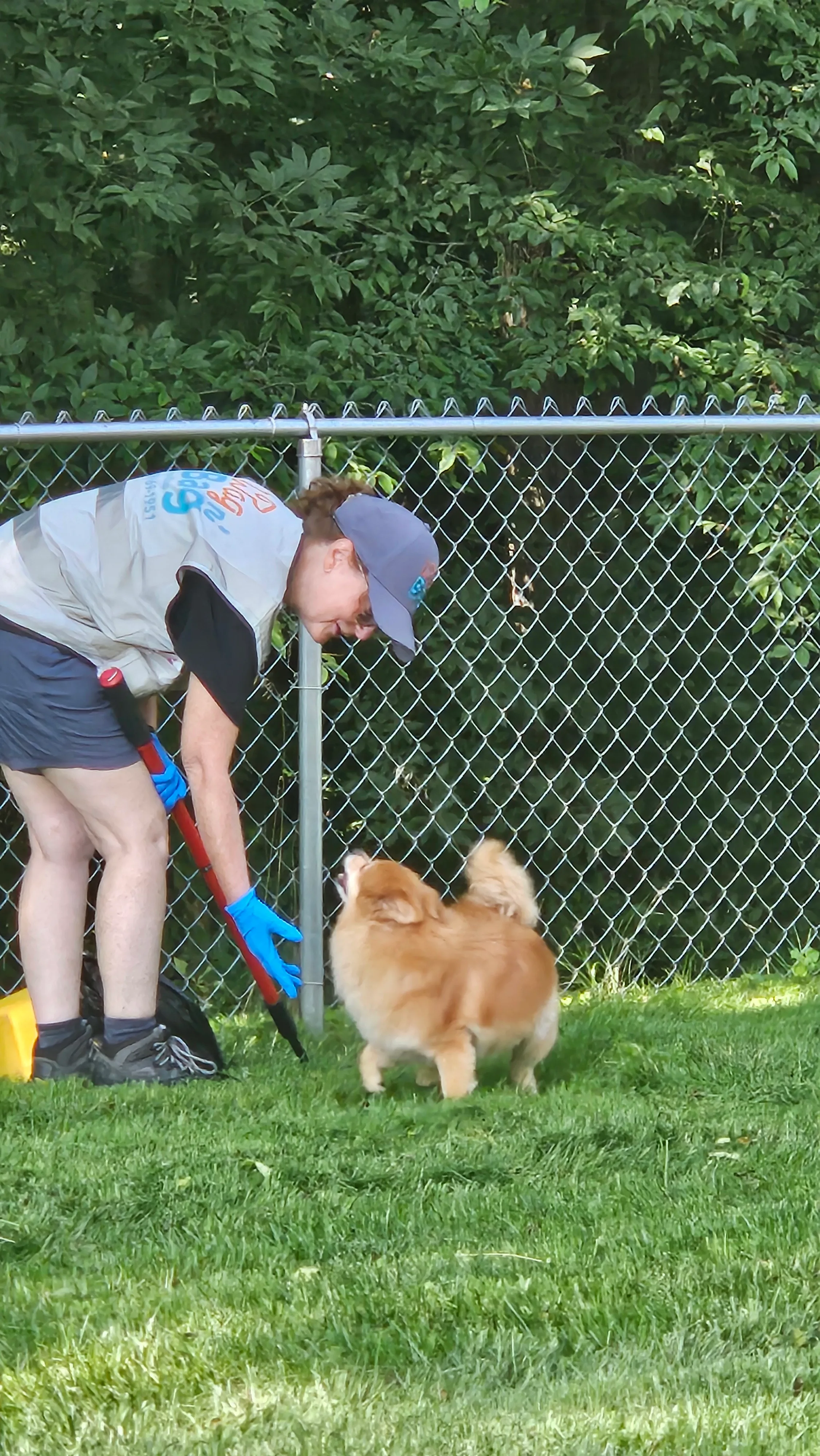 Cindy from Wag n' Bag greeting a happy dog