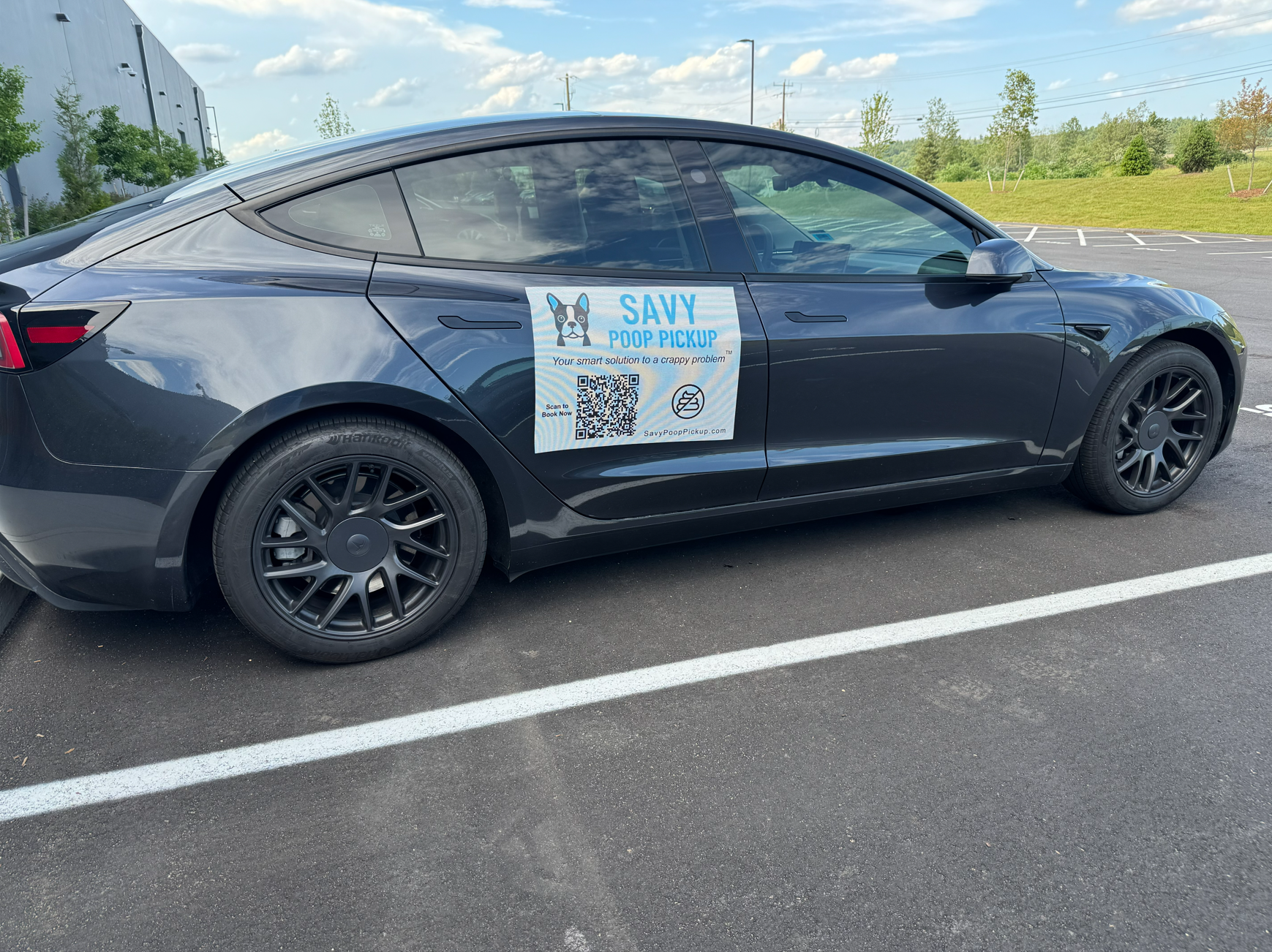 Savy Poop Pickup car door decal showing the pet waste removal service and a QR code
