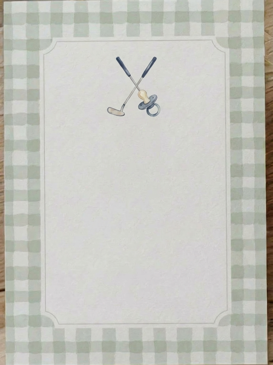 Golf and pacifier design stationery with a golf club and pacifier at top center