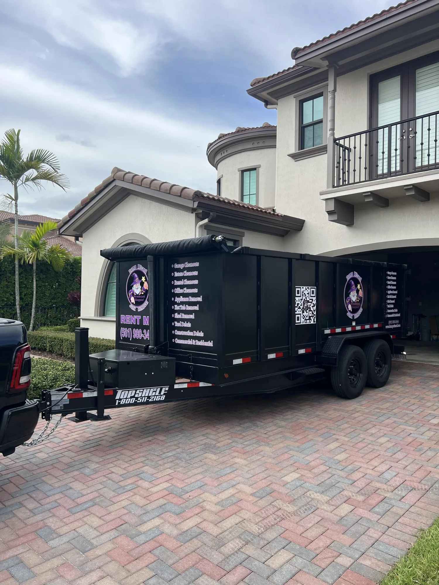 Dump Wizard trailer parked at a South Florida residence