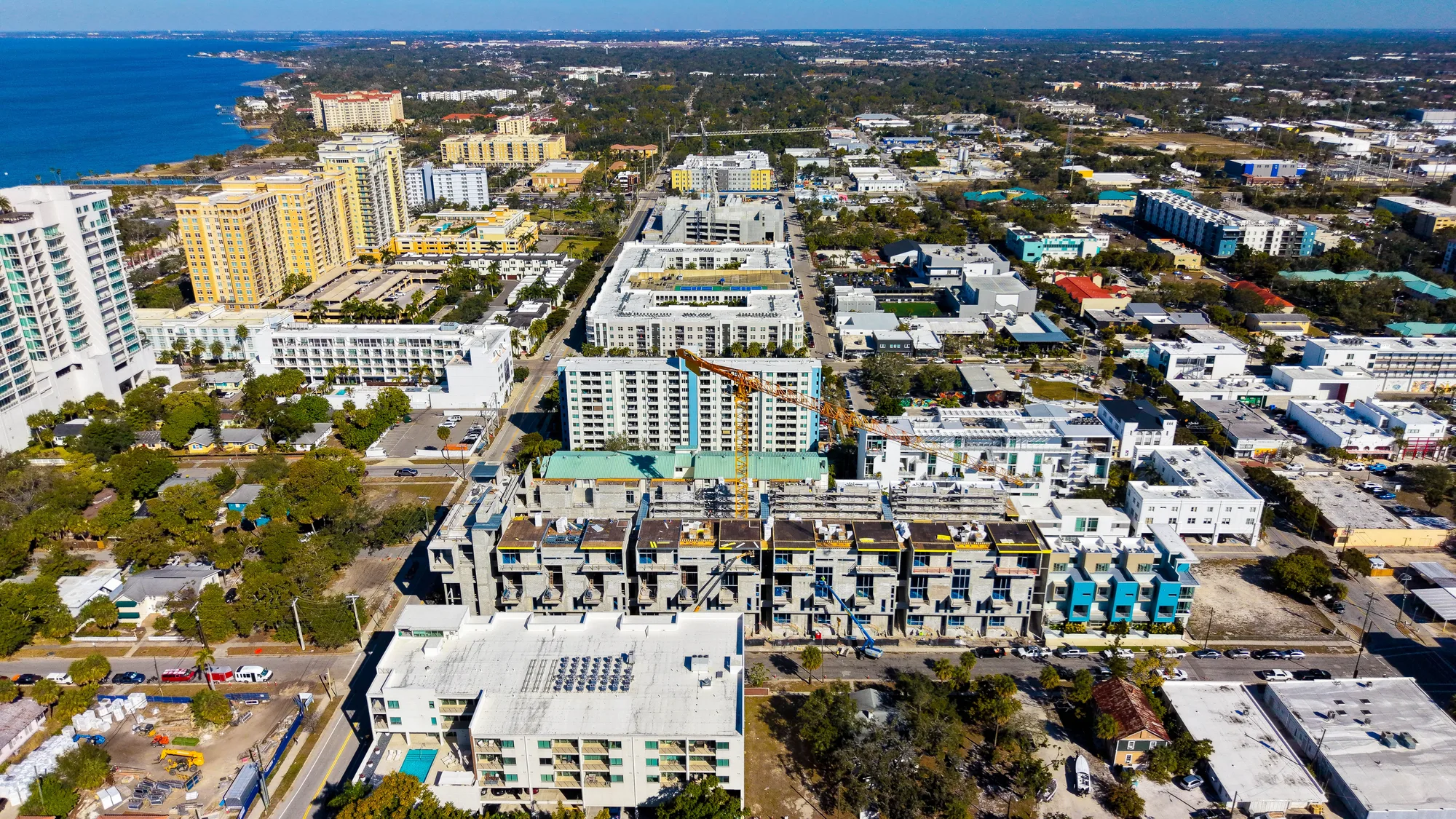 Aerial of The Gallery development in Sarasota with the Gulf visible in the distance.