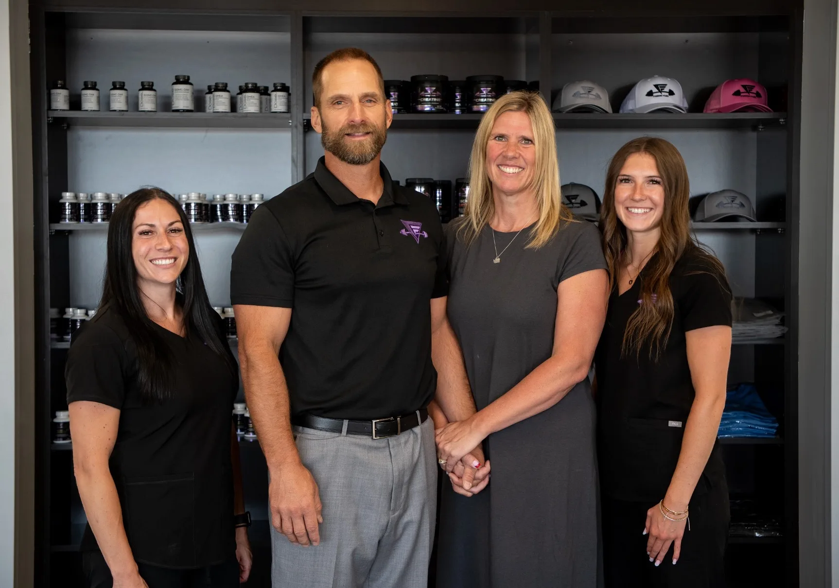 The Forge Health & Performance wellness team in their store.