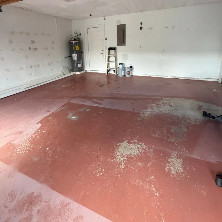 The same garage completely cleared and swept after the Dump Wizard cleanout