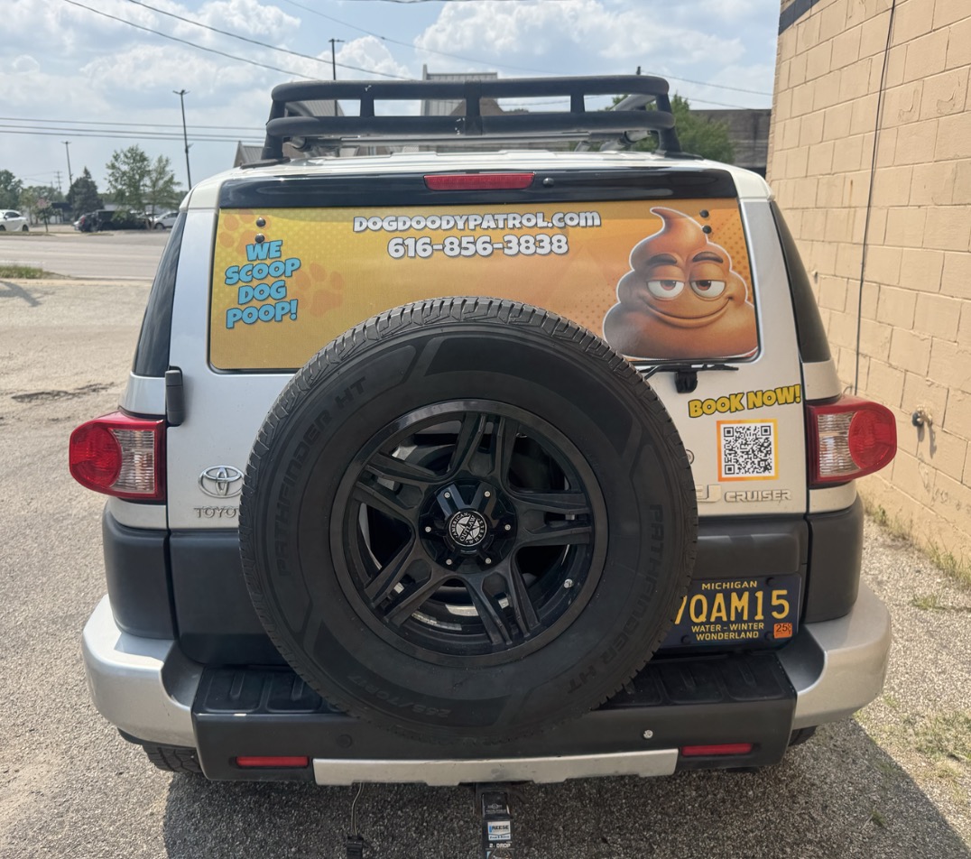 Dog Doody Patrol vehicle for yard sanitizing and deodorizing service