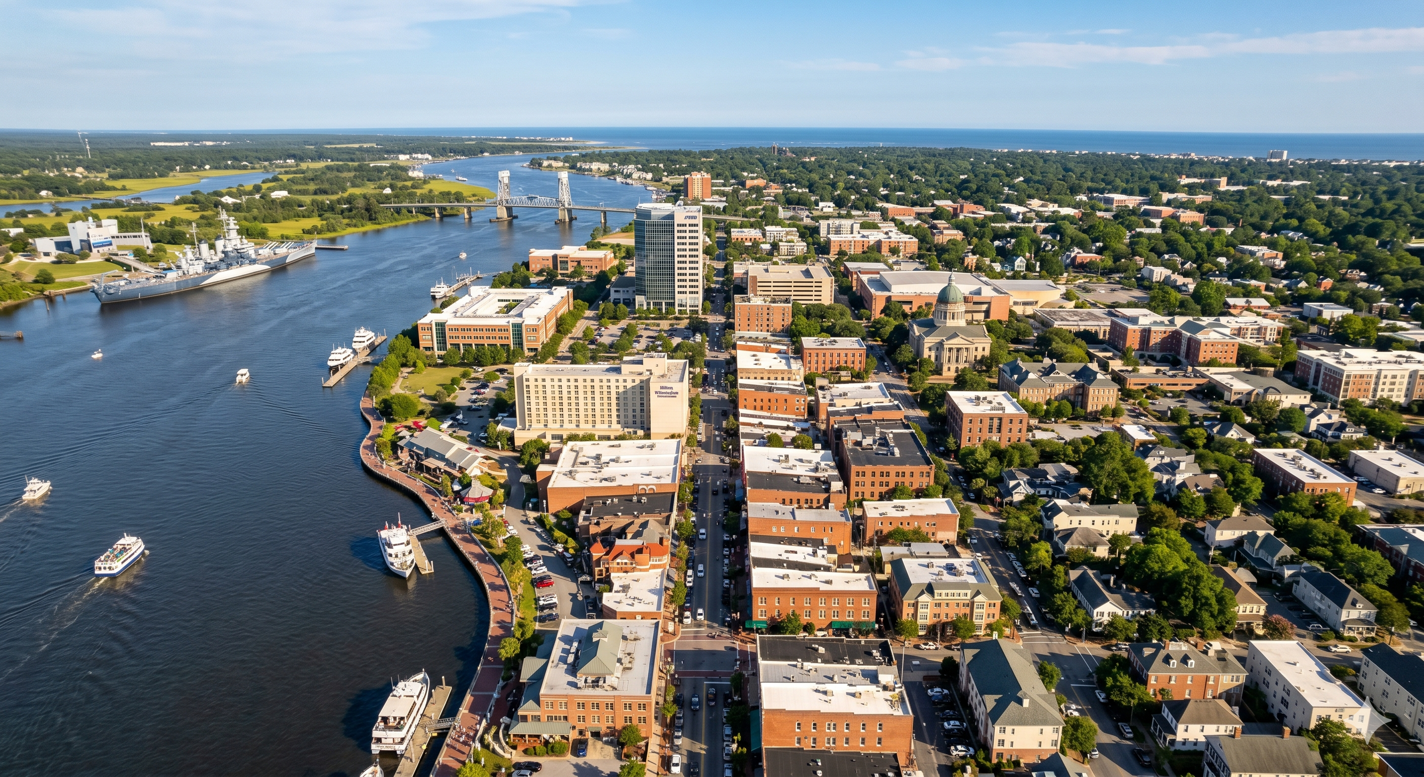 Aerial view of Wilmington, North Carolina, with the Cape Fear River waterfront and downtown skyline