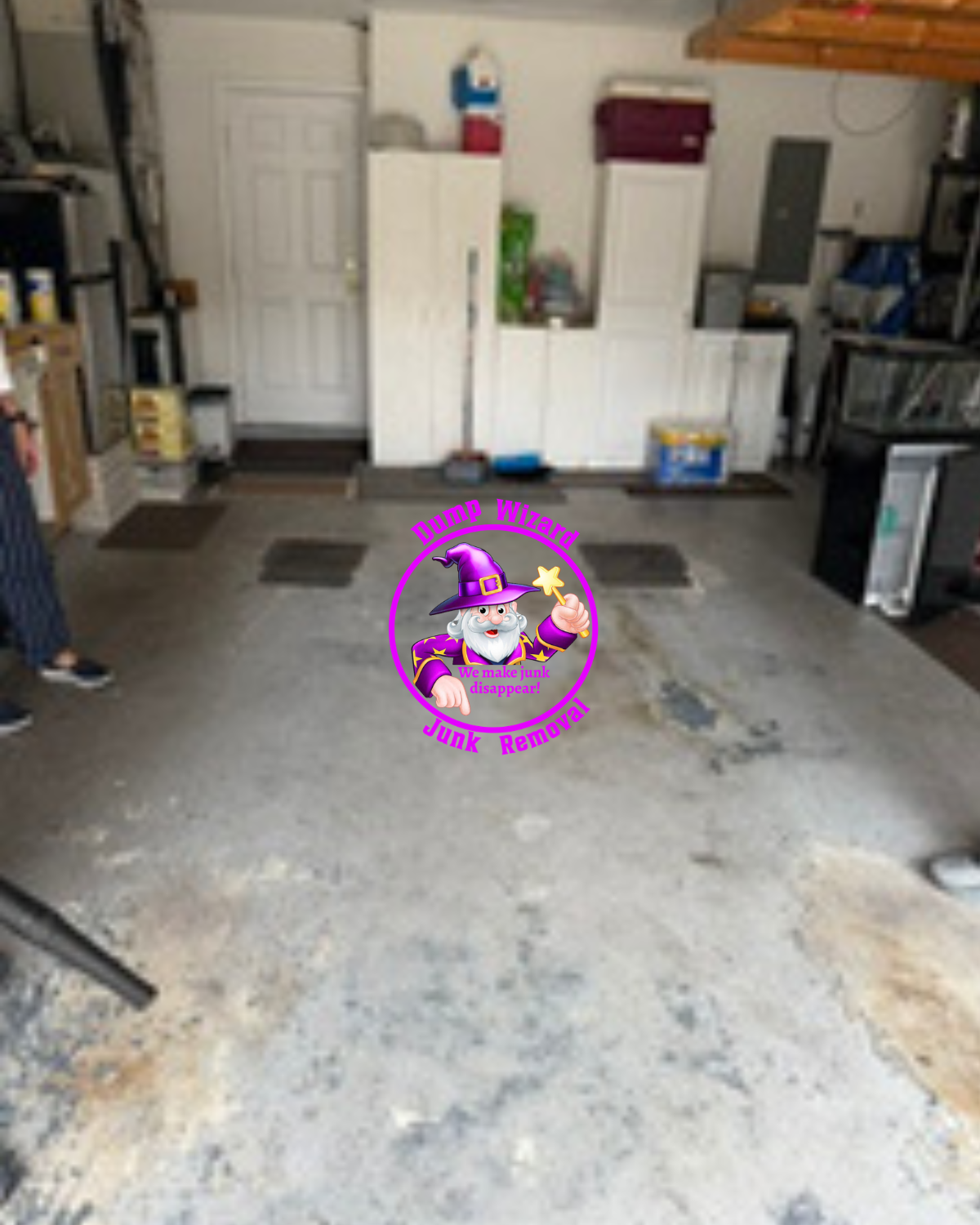After: the same garage cleared to a clean, open floor