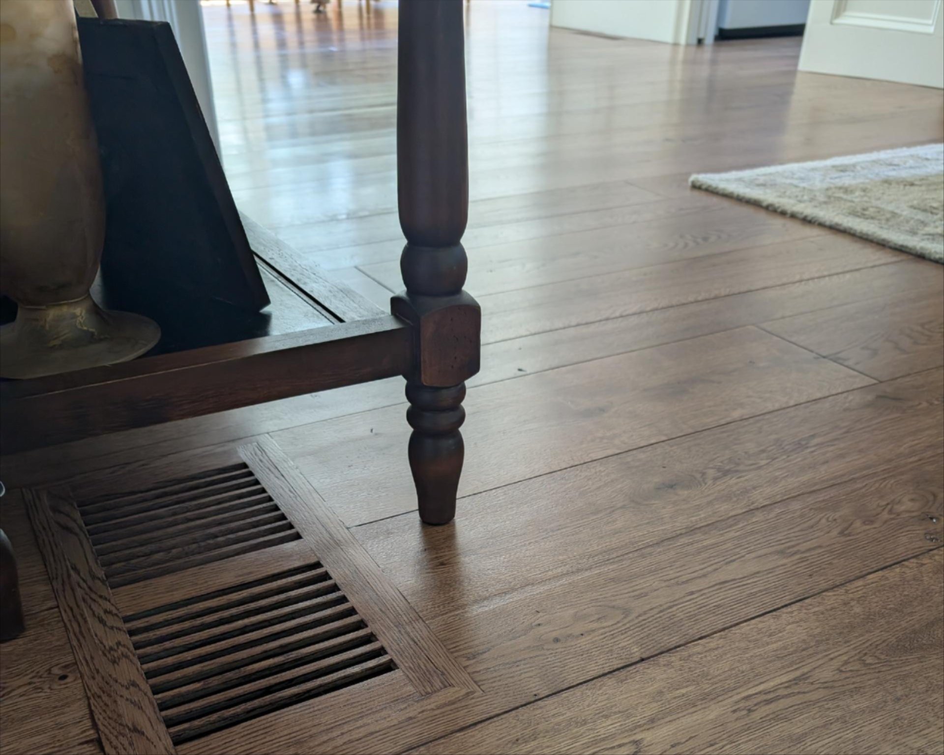 Close-up detail of hardwood floor grain and finish