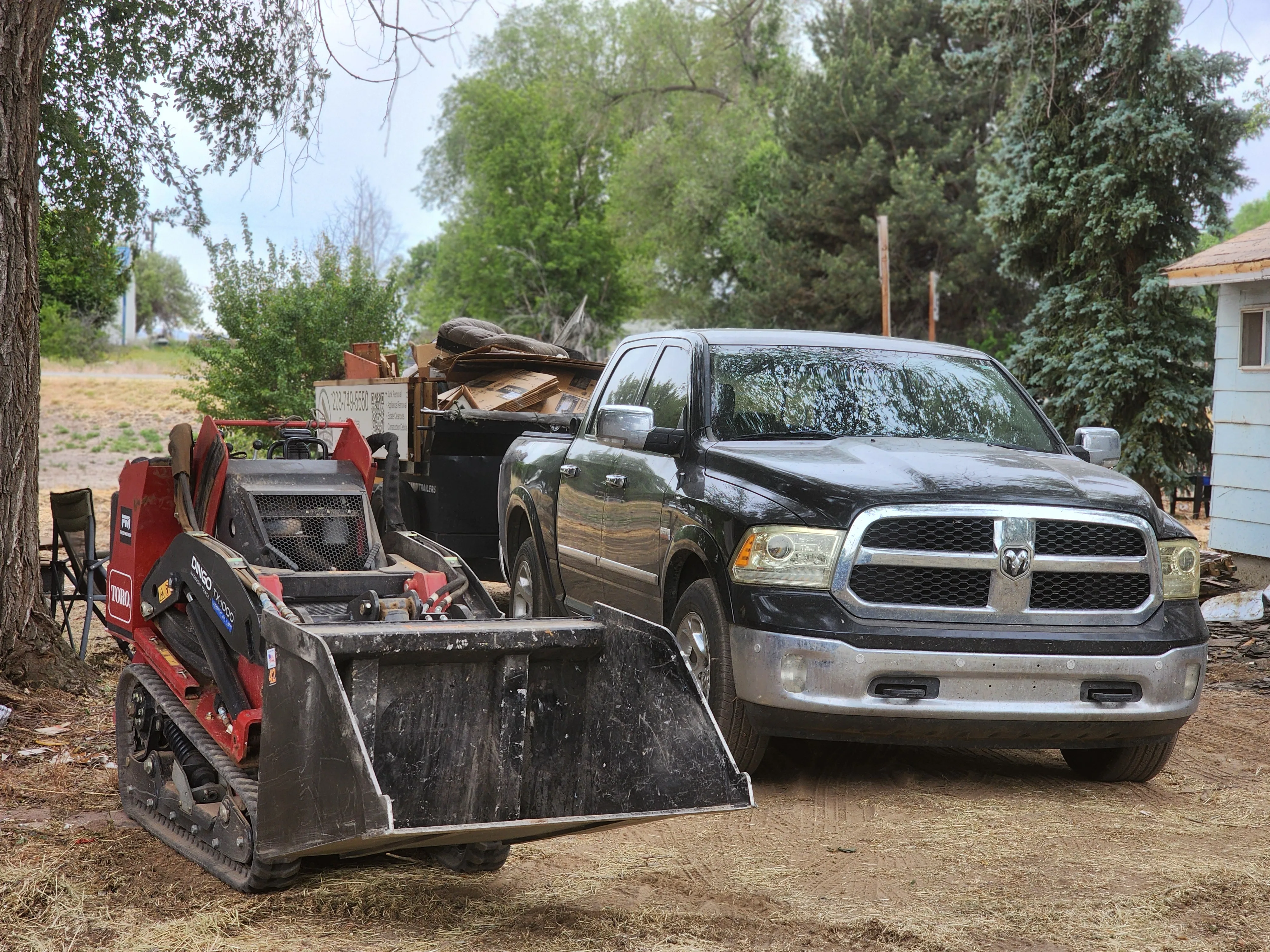 Magic Valley Junk Removal & Demolition truck on the job