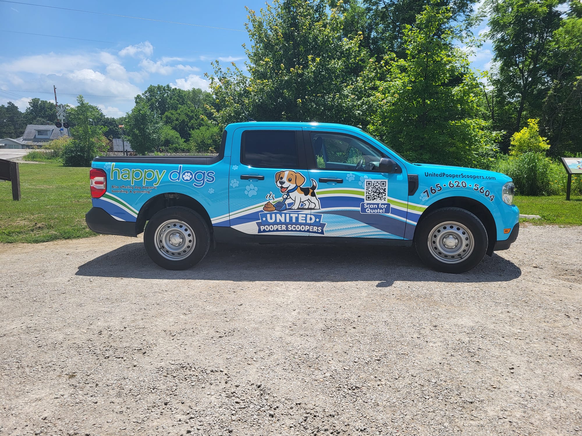 United Pooper Scoopers truck pulling up for a scheduled yard cleanup
