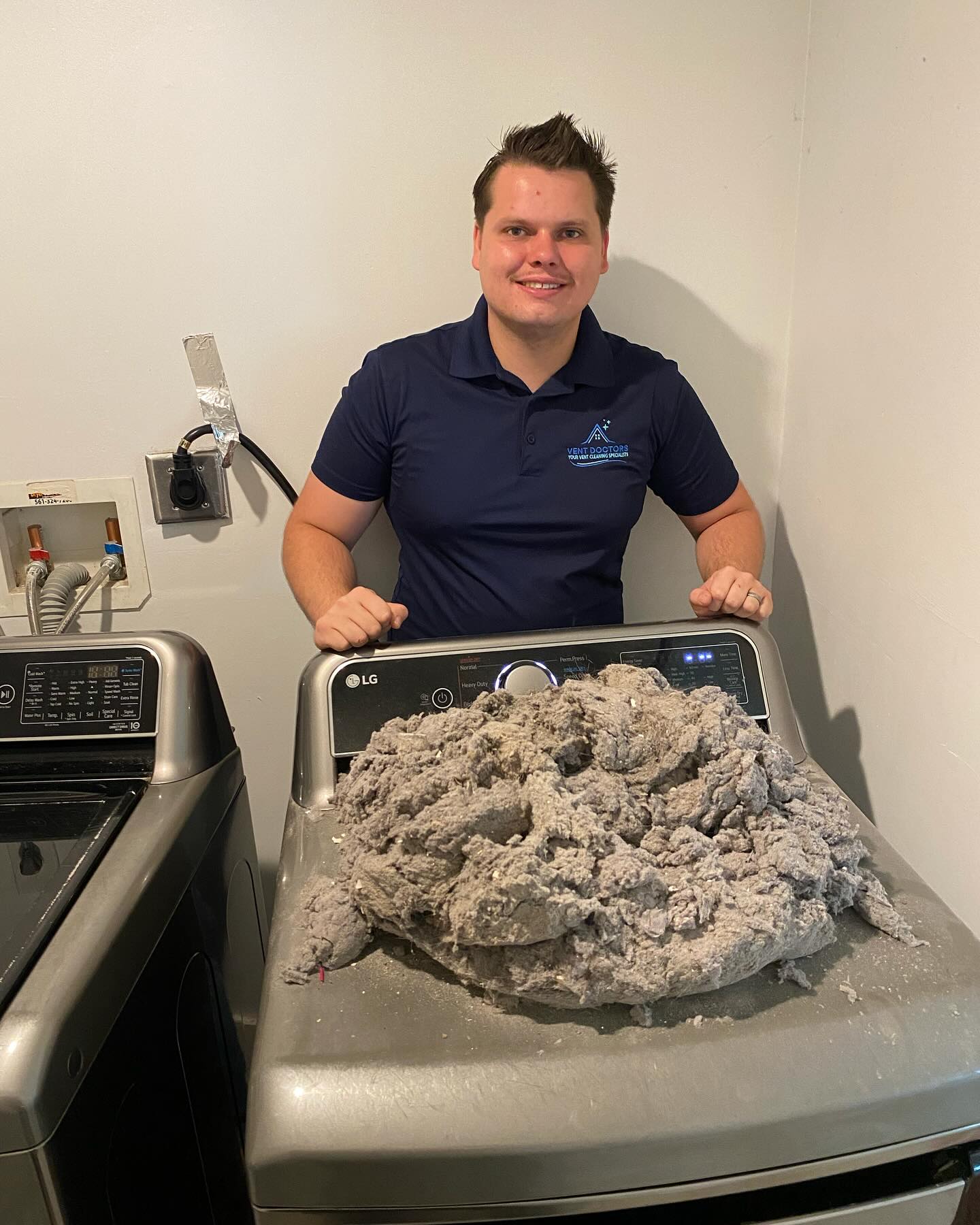 Large pile of dryer lint removed from a residential dryer vent in Port St. Lucie, FL