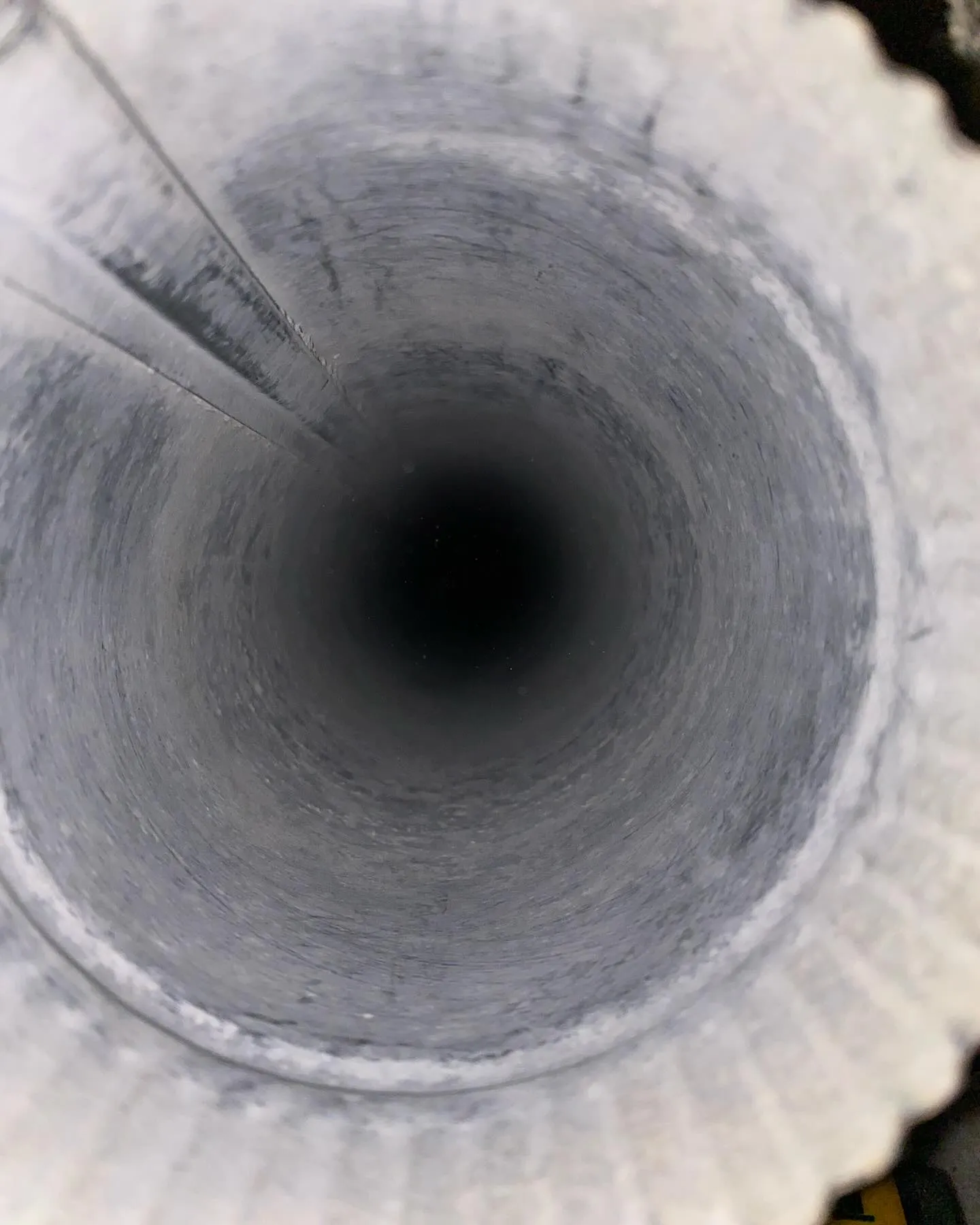 Clean interior of a vertical pipe after dryer vent cleaning