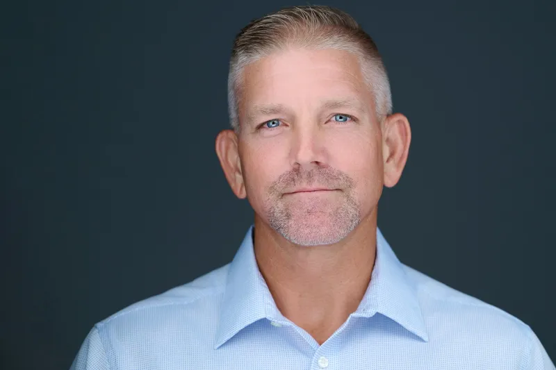 Professional headshot of Wendell Clark