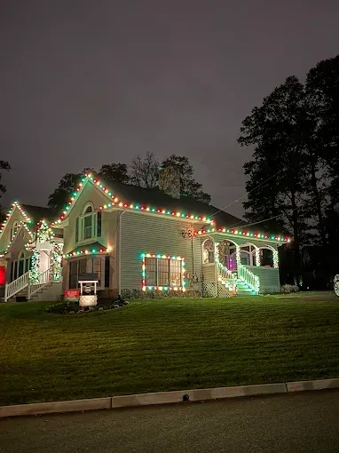 Elegant roofline and window lighting on a charming home in Ridgewood